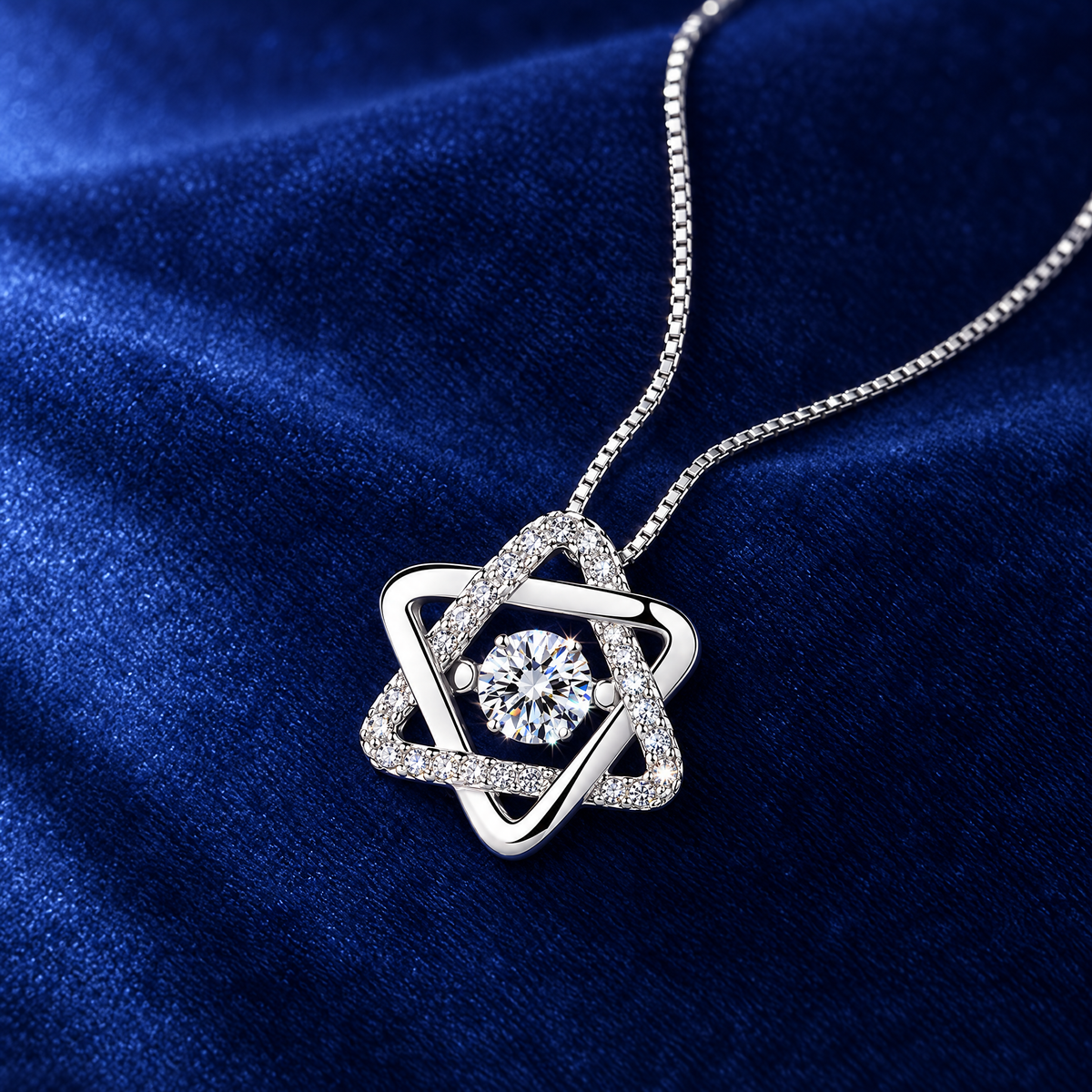 Moissanite Star of David pendant on royal blue velvet