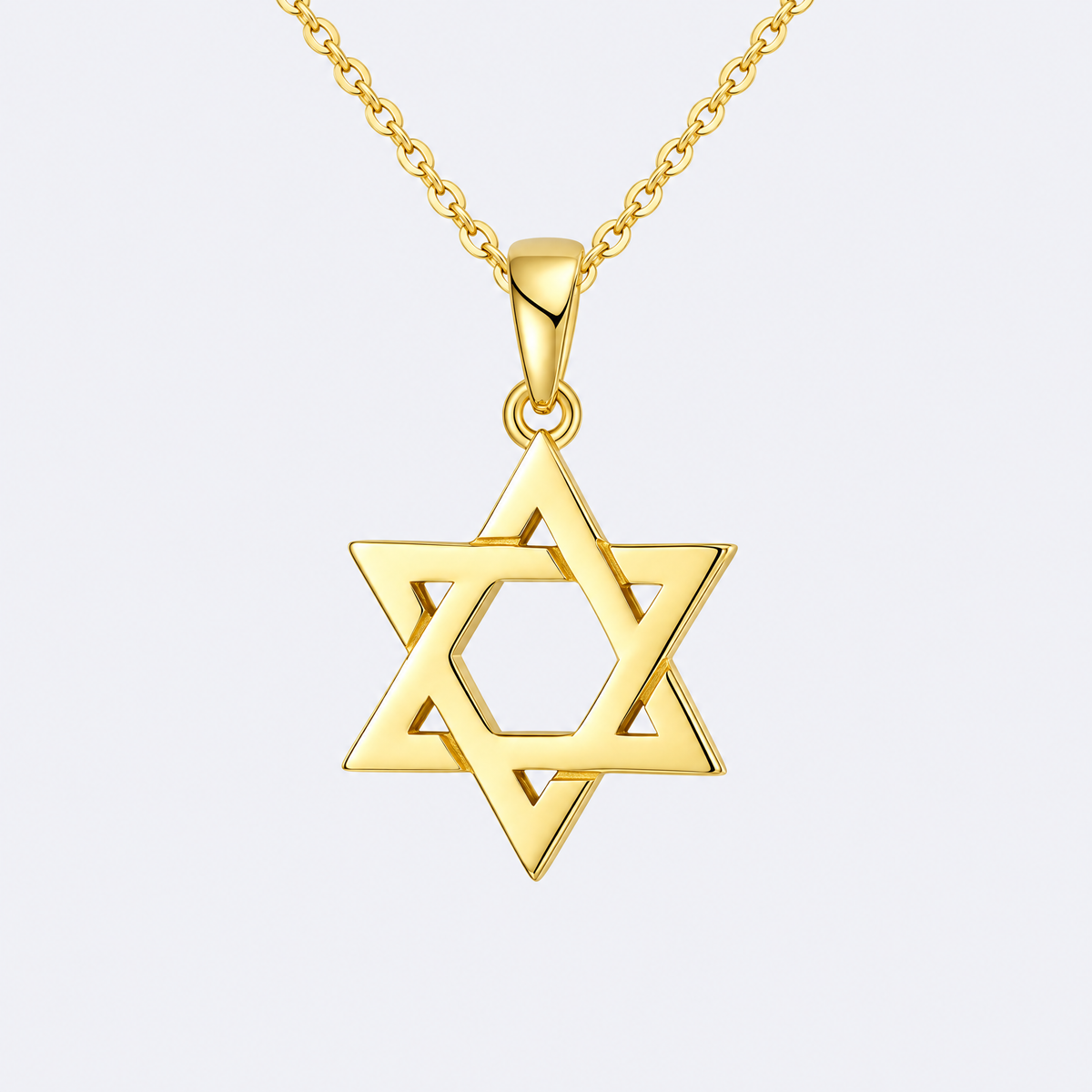 Gold Magen David necklace in sterling silver, studio photo