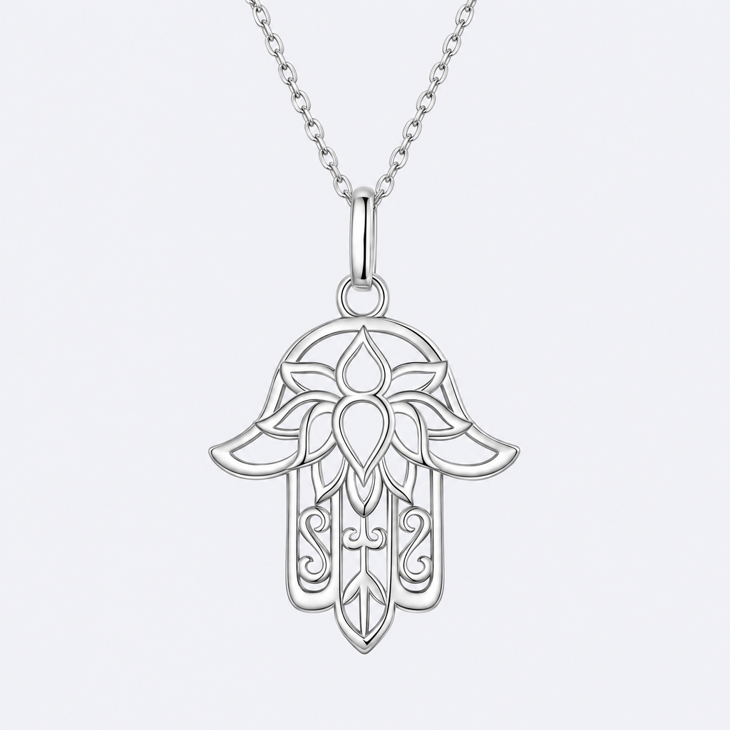 Lace hamsa necklace in sterling silver, studio photo