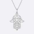 Lace hamsa necklace in sterling silver, studio photo