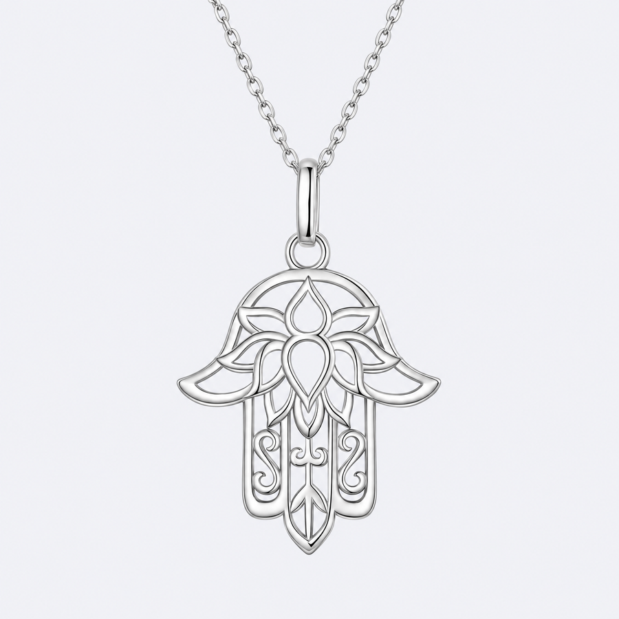 Lace hamsa necklace in sterling silver, studio photo