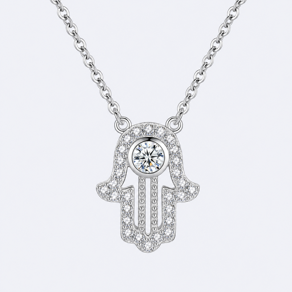 Pavé hamsa necklace in sterling silver, studio photo