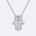 Pavé hamsa necklace in sterling silver, studio photo