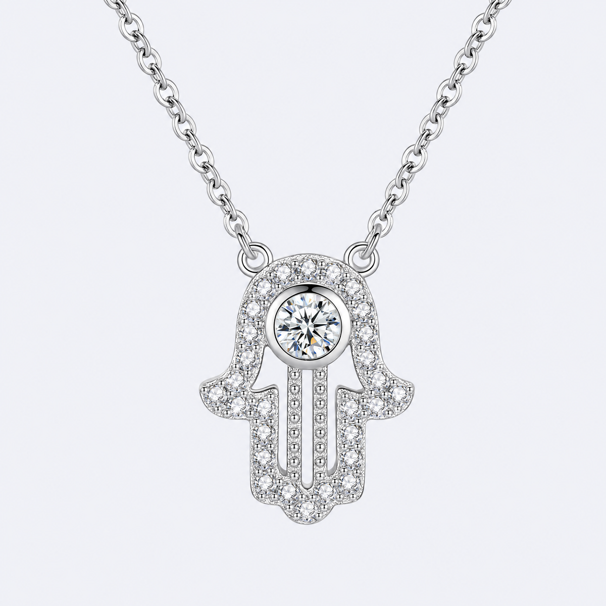 Pavé hamsa necklace in sterling silver, studio photo