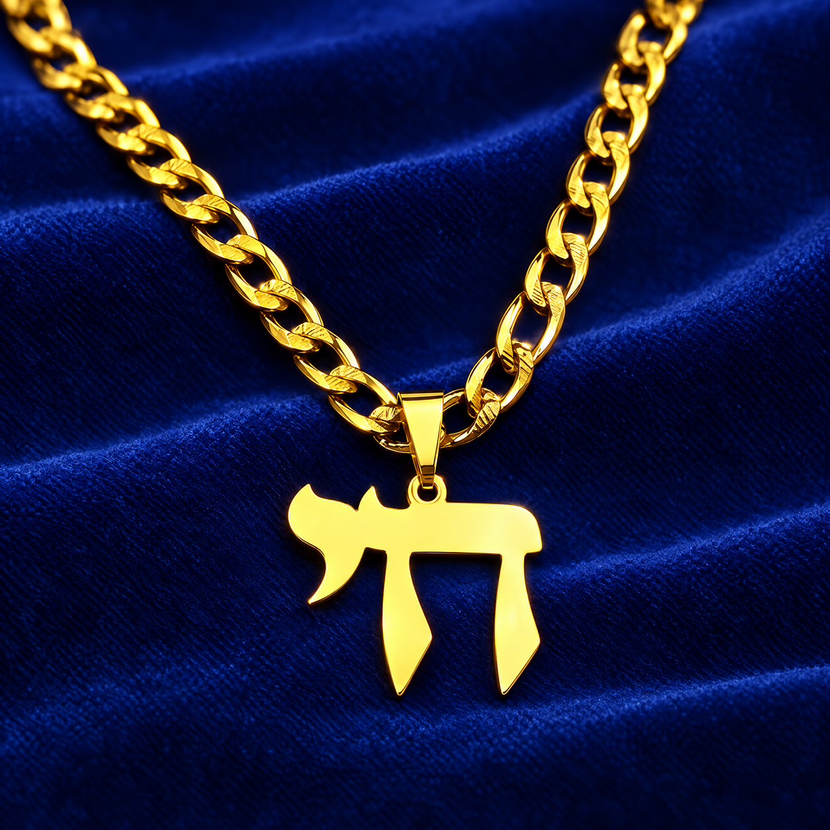 Gold Chai necklace on royal blue velvet