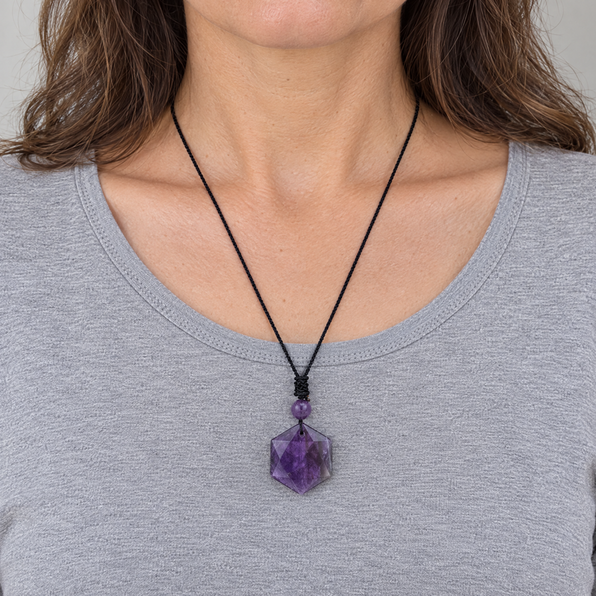 Amethyst Star of David pendant worn, shown at real size (29 x 29 mm)