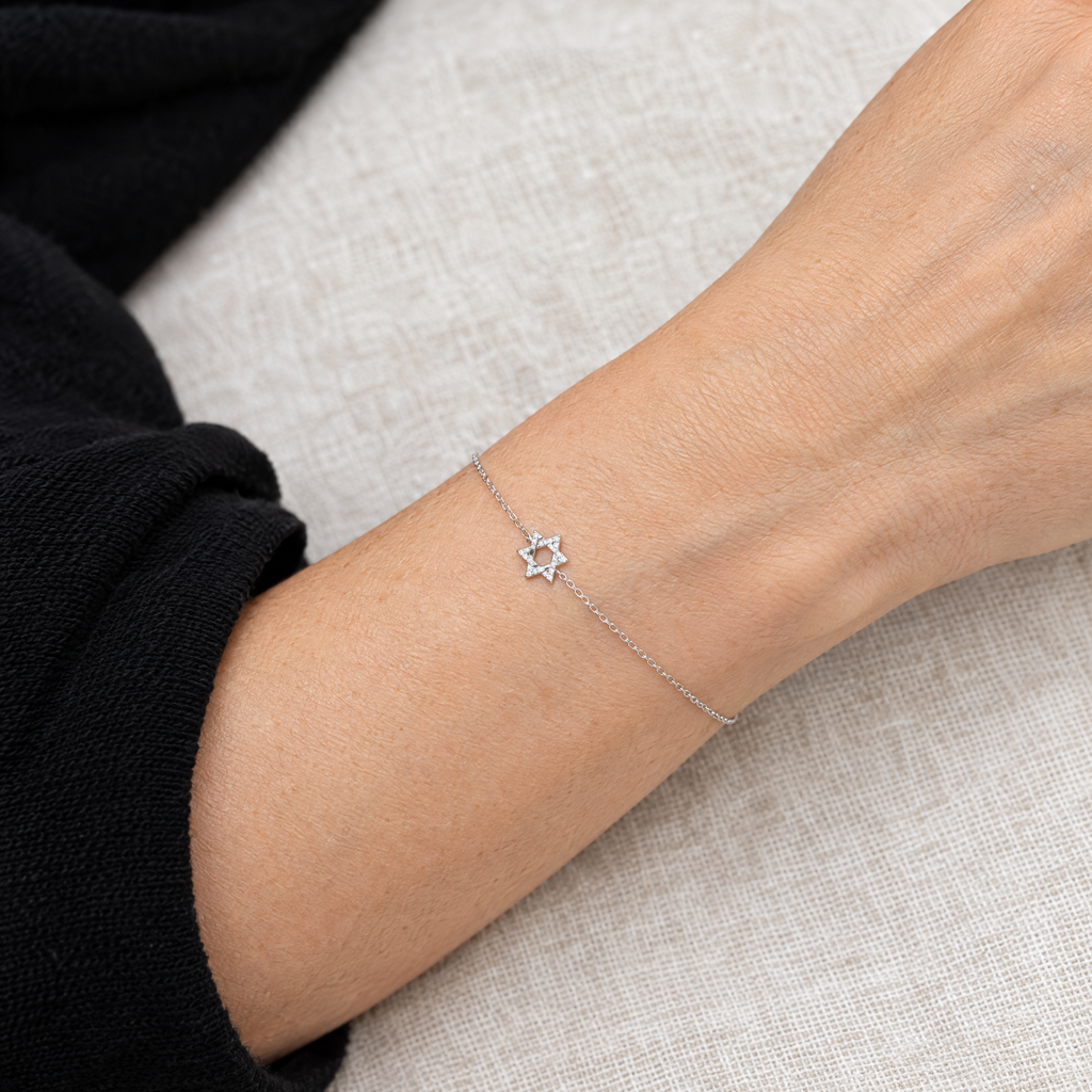 Star of David bracelet in sterling silver worn, shown at real size (9.5 mm star)