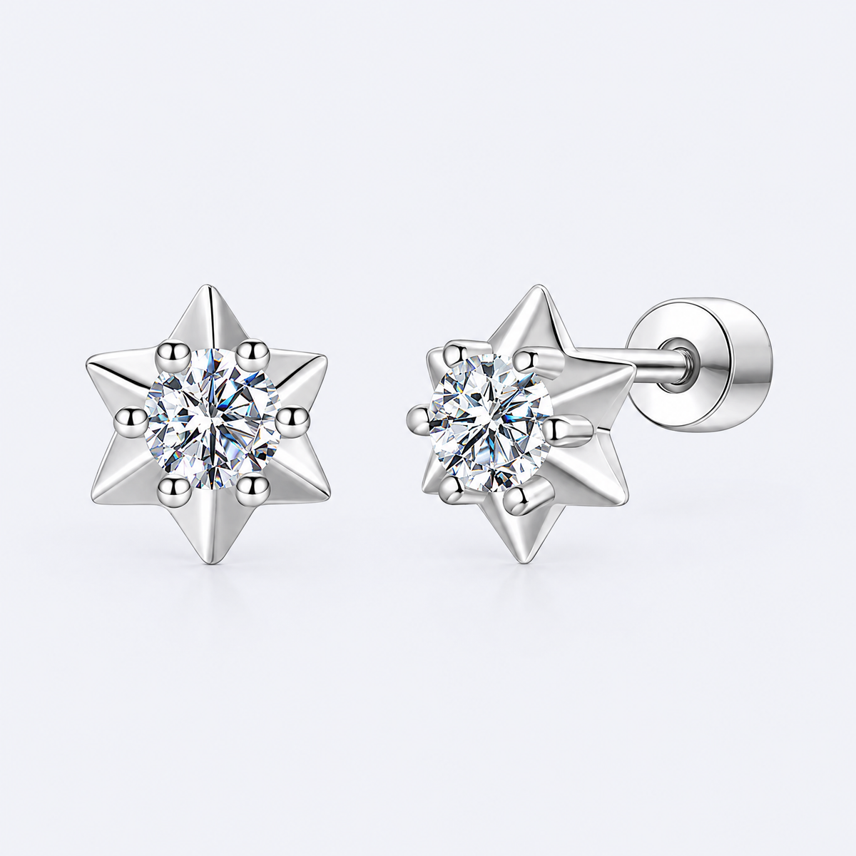 Moissanite star stud earrings in sterling silver, studio photo
