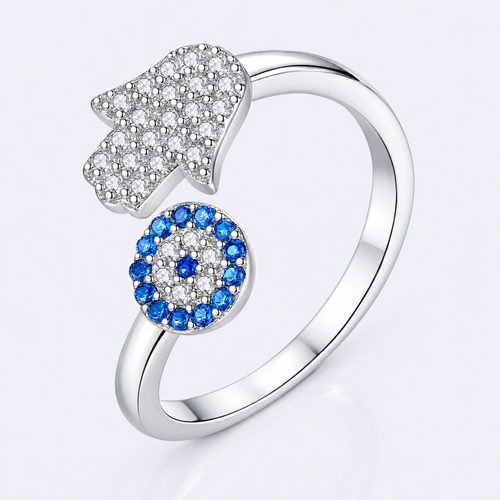 Adjustable hamsa and blue eye ring in sterling silver, studio photo