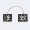 Star of David tallit clips, studio photo