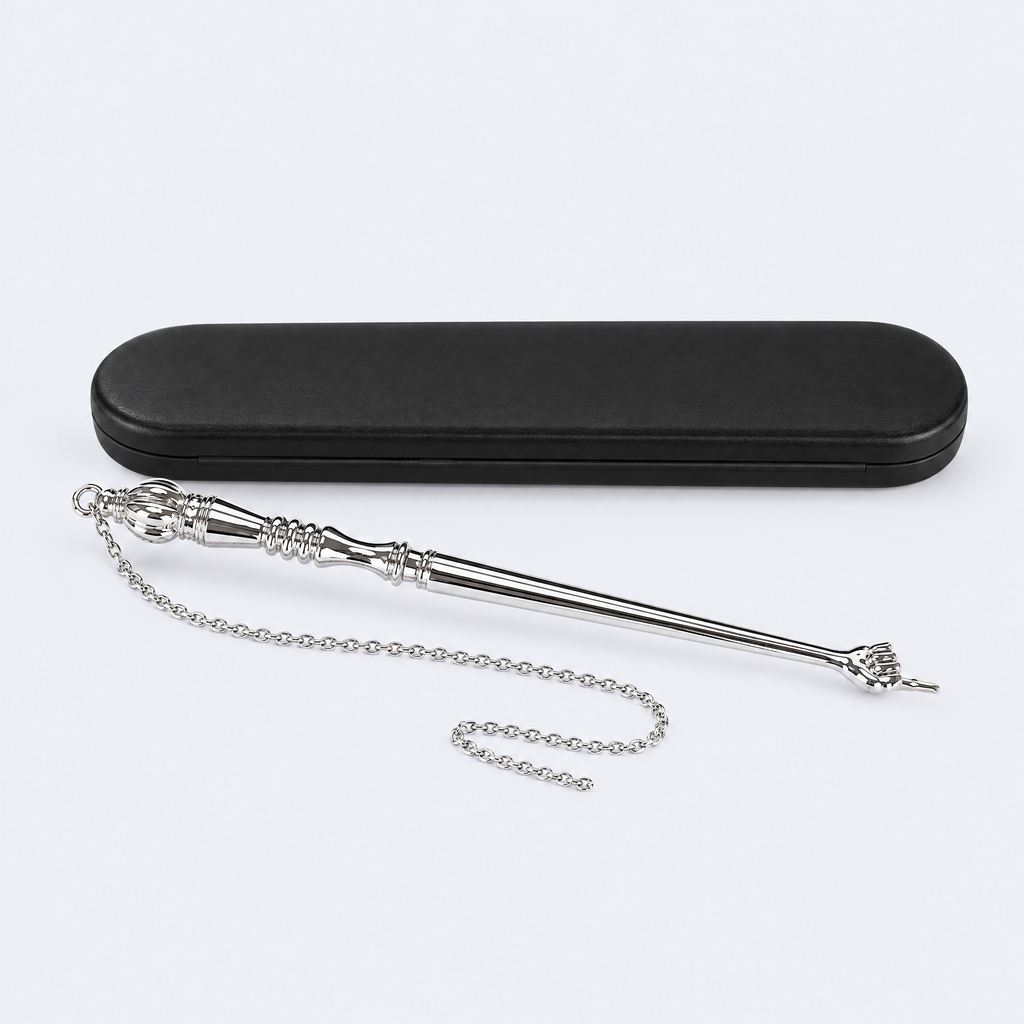 Silver Torah pointer (yad) with its gift case, studio photo