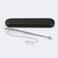Silver Torah pointer (yad) with its gift case, studio photo