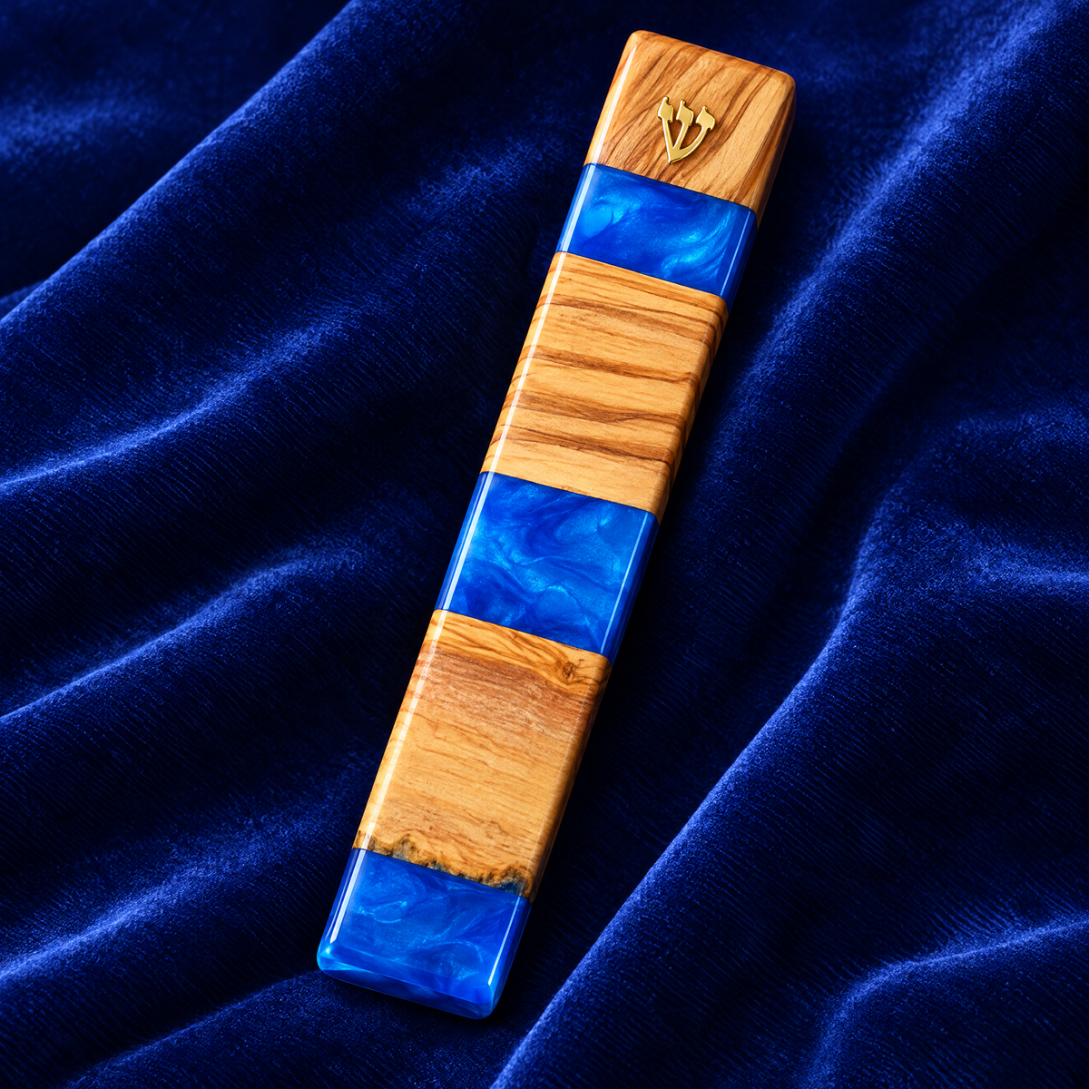 Olive wood and blue resin mezuzah case, close-up detail
