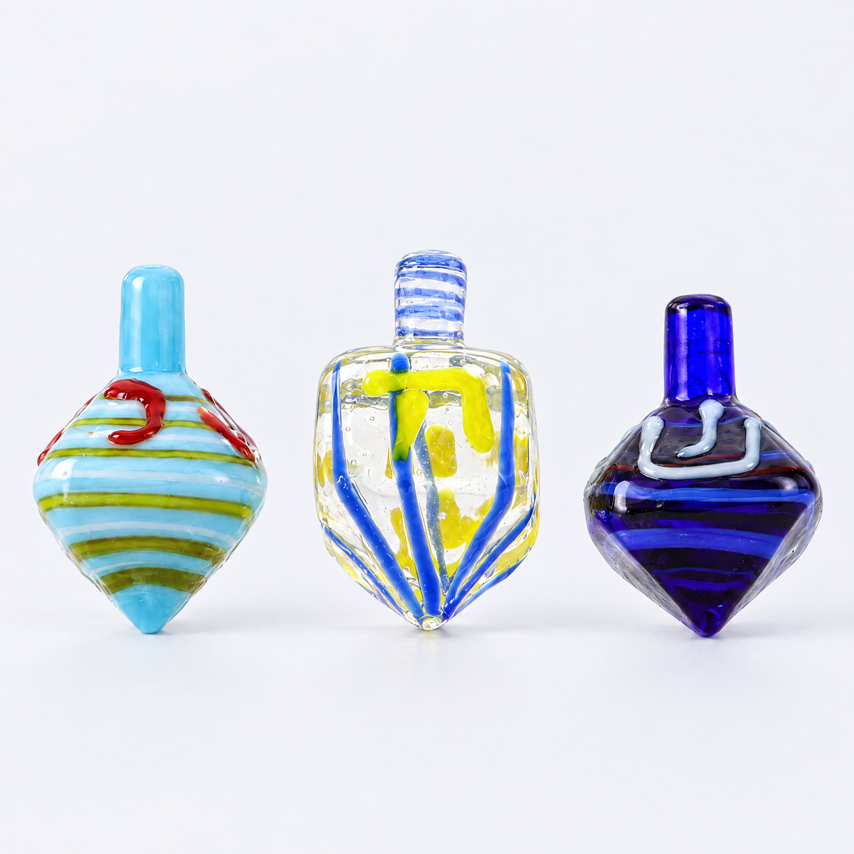 Glass dreidel set of 3, studio photo